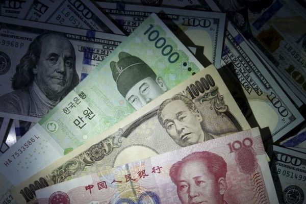 Các ngân hàng trung ương châu Á chật vật 'chế ngự' đô la